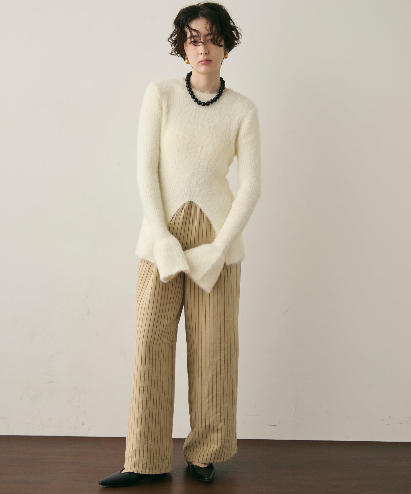 シャギーベルスリーブスリットプルオーバー