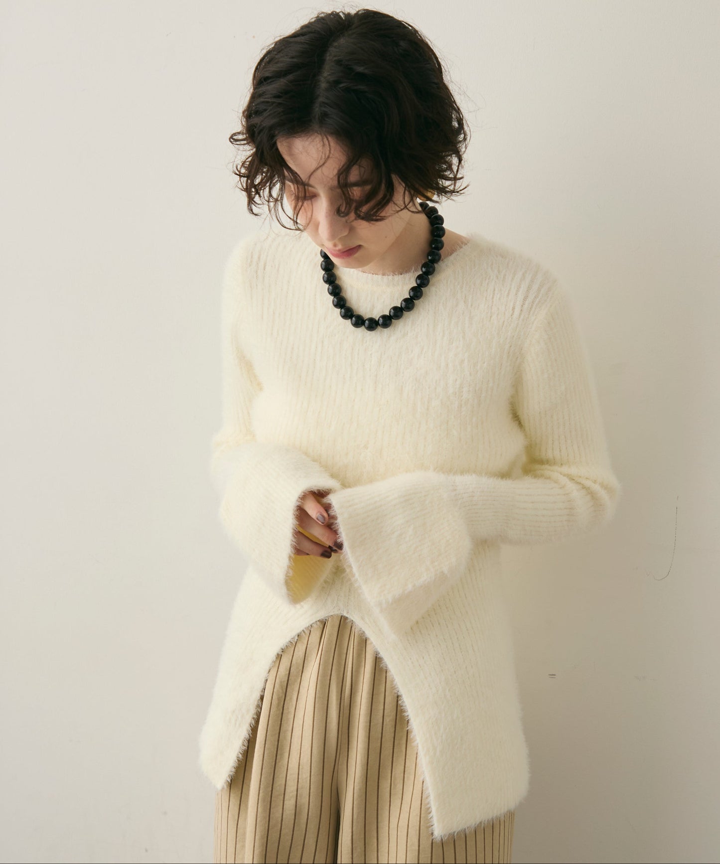 シャギーベルスリーブスリットプルオーバー