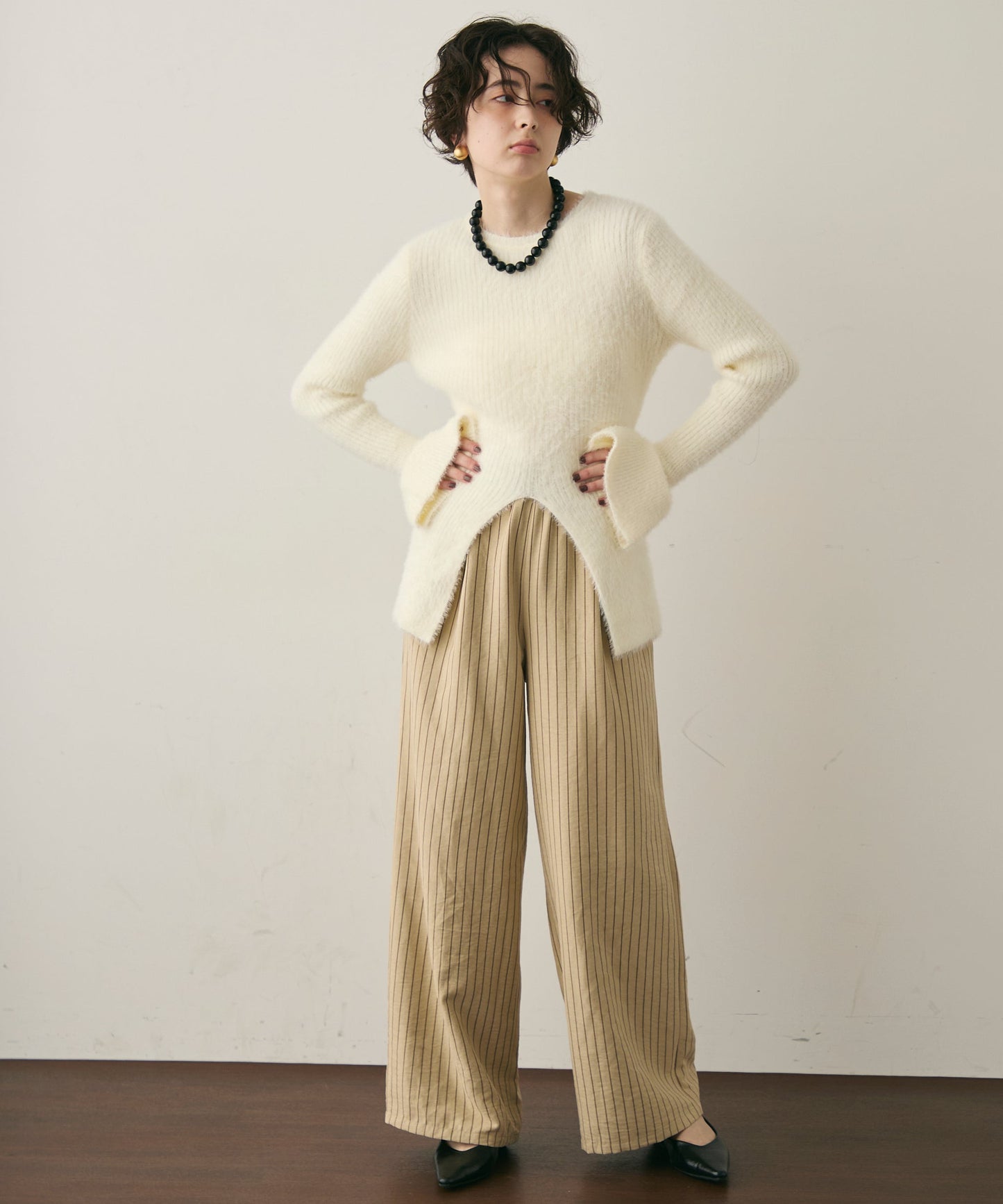 シャギーベルスリーブスリットプルオーバー