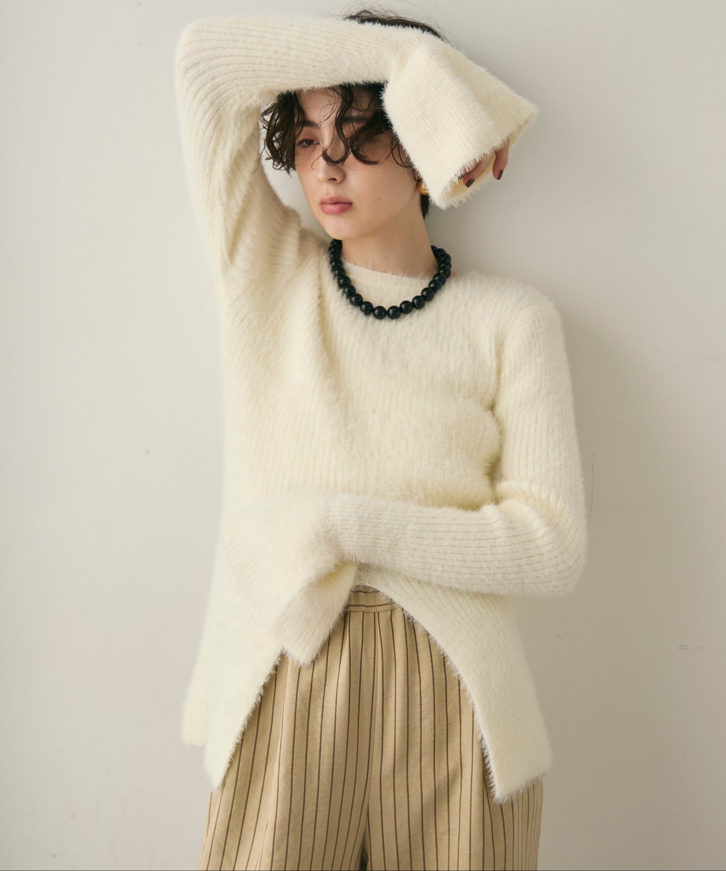 シャギーベルスリーブスリットプルオーバー