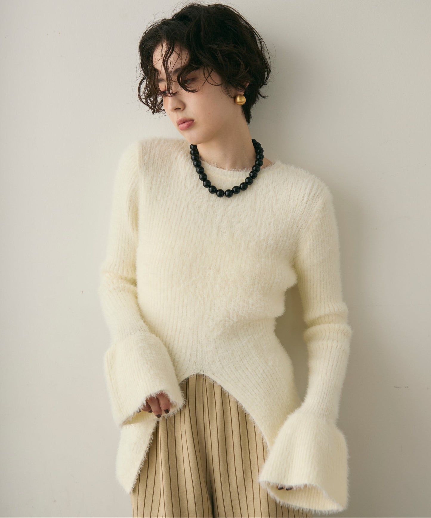 シャギーベルスリーブスリットプルオーバー