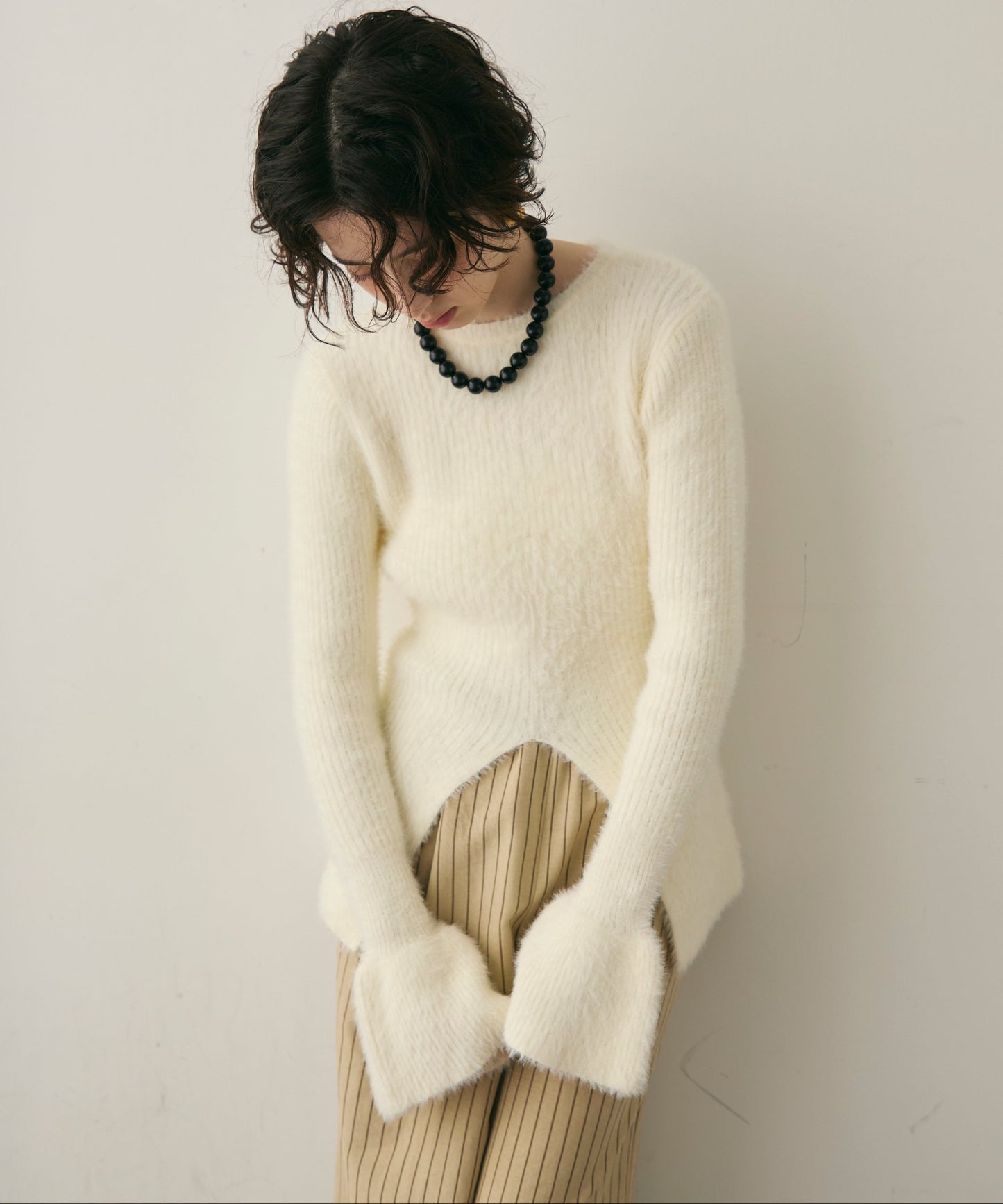 シャギーベルスリーブスリットプルオーバー
