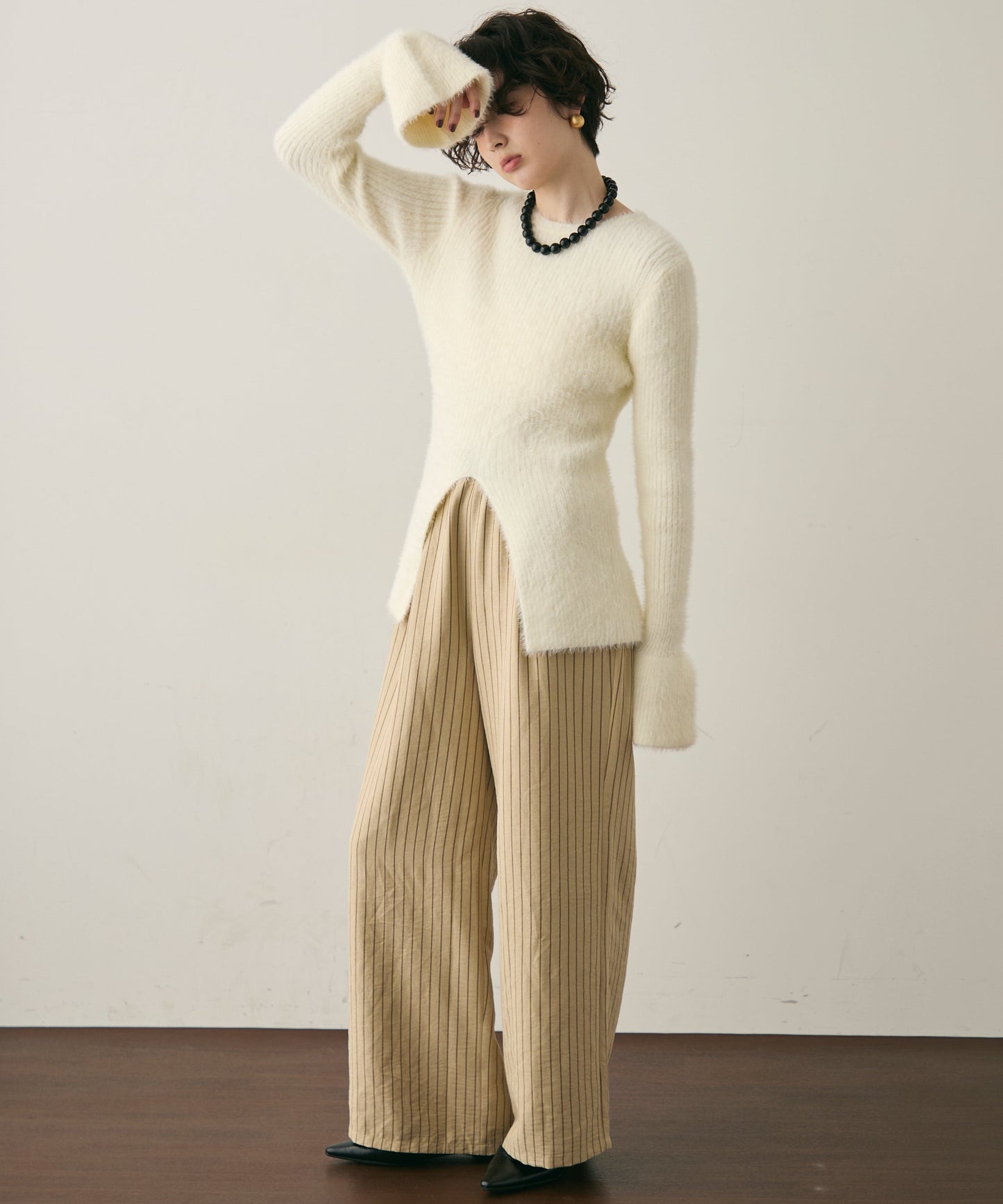 シャギーベルスリーブスリットプルオーバー