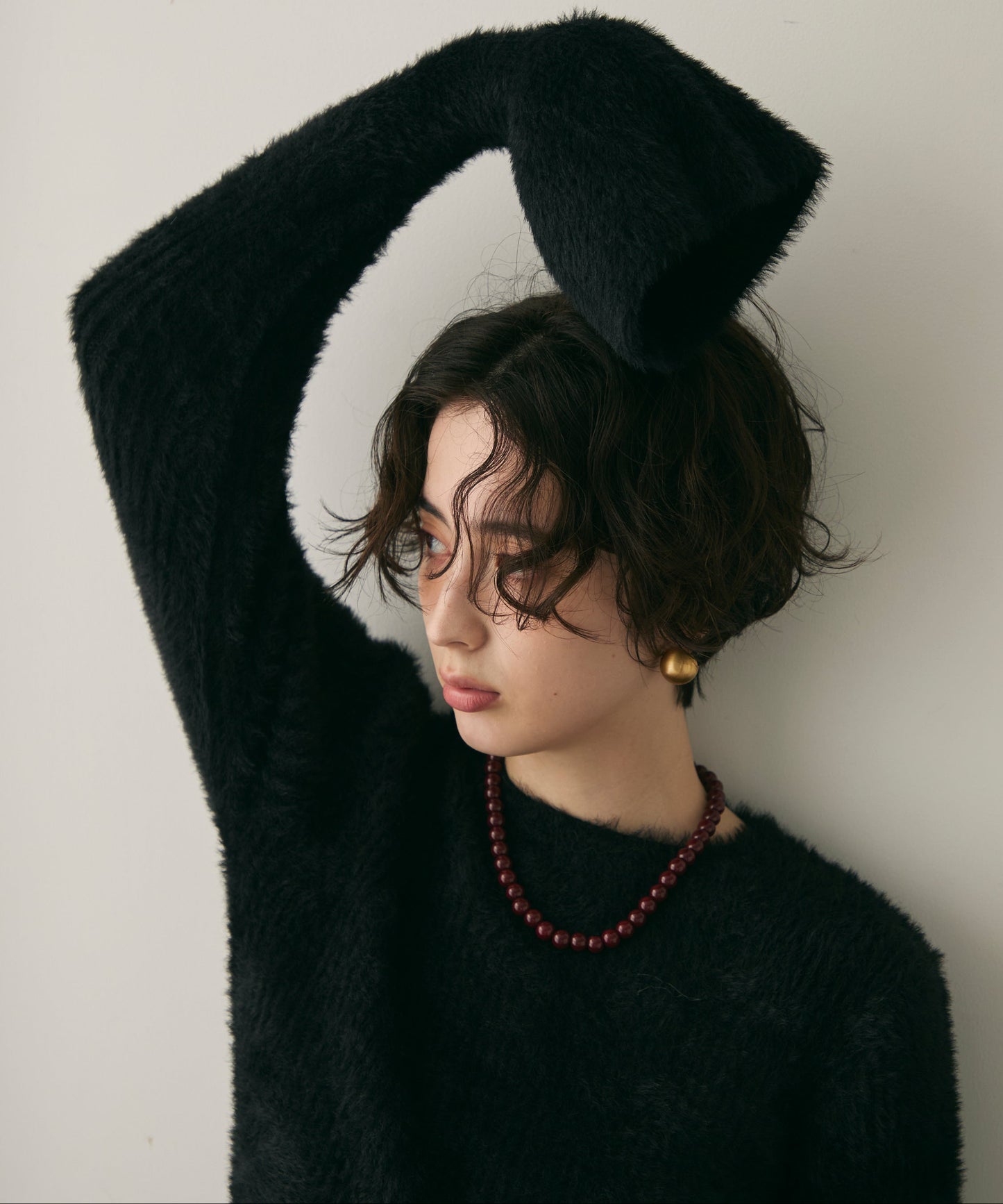 シャギーベルスリーブスリットプルオーバー