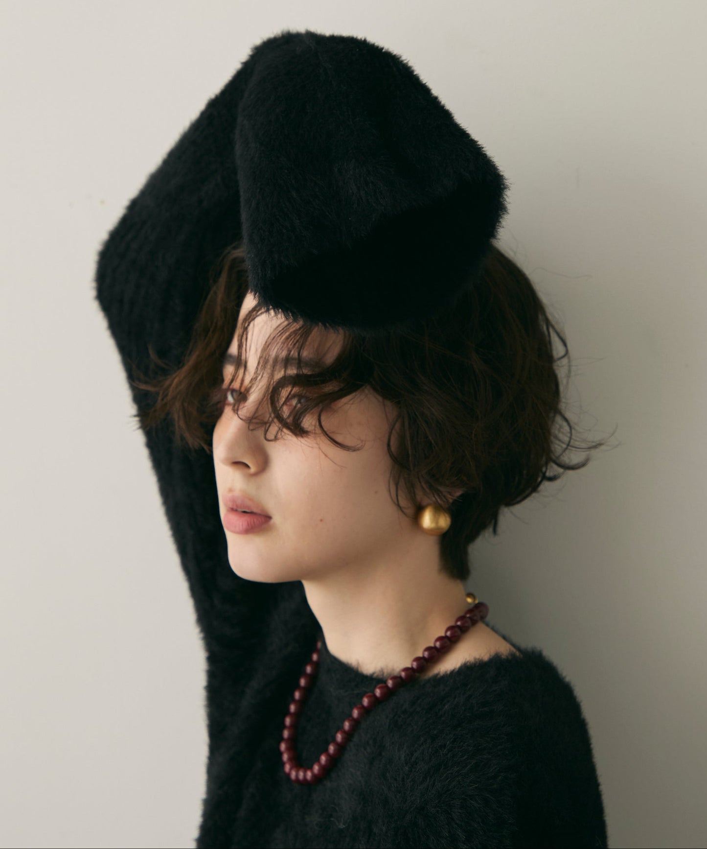 シャギーベルスリーブスリットプルオーバー