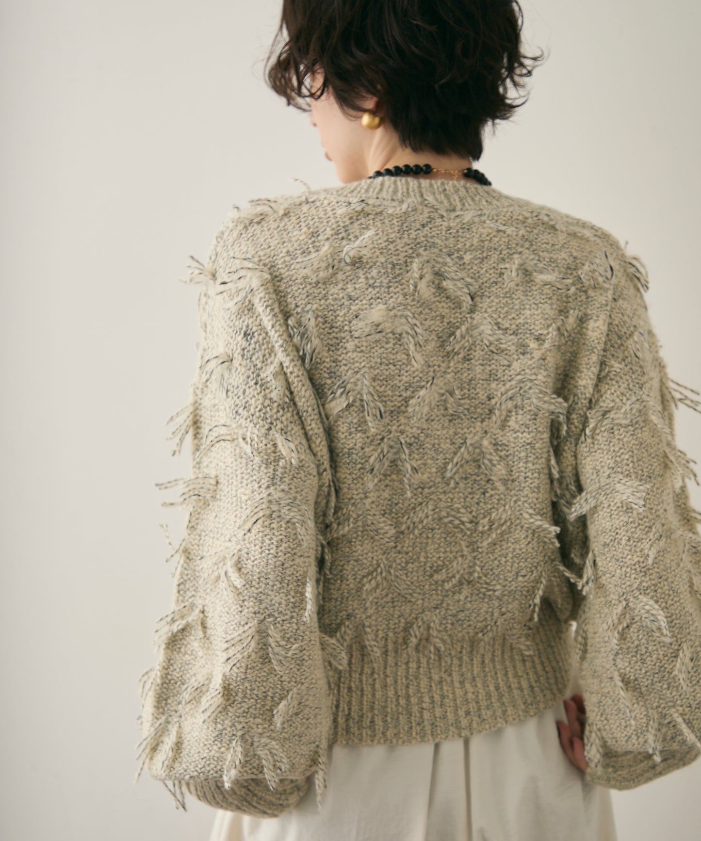 ランダムフリンジパフスリーブプルオーバー