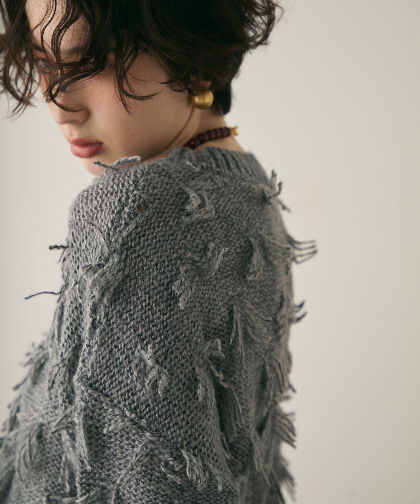 ランダムフリンジパフスリーブプルオーバー