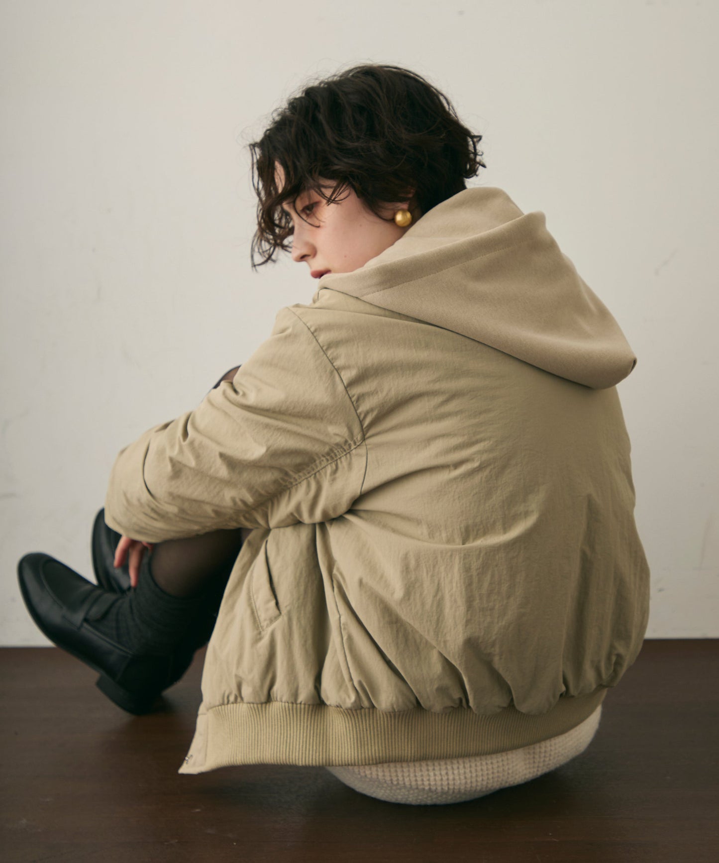 フェイクレイヤードフーデッドボンバージャケット