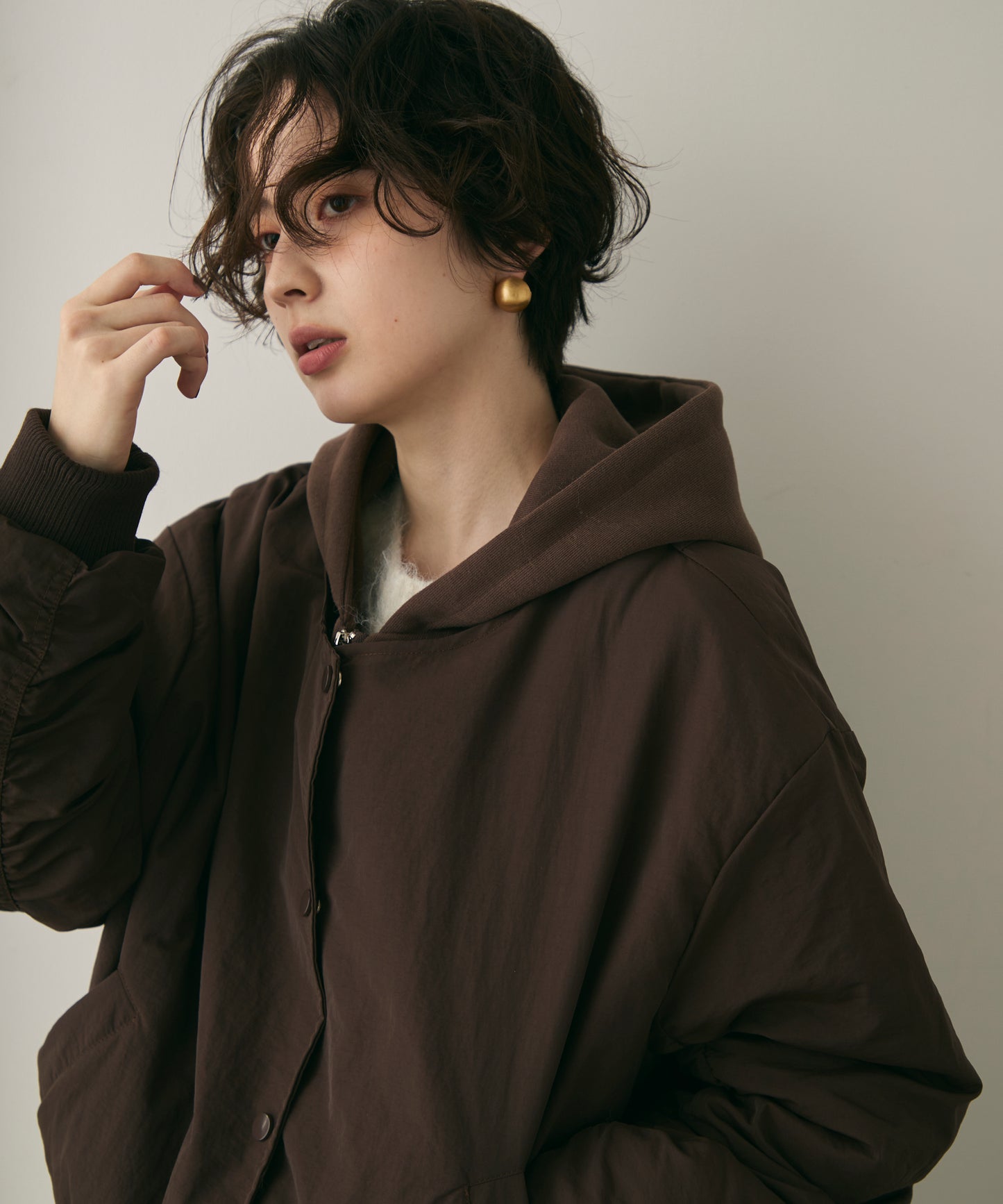 フェイクレイヤードフーデッドボンバージャケット