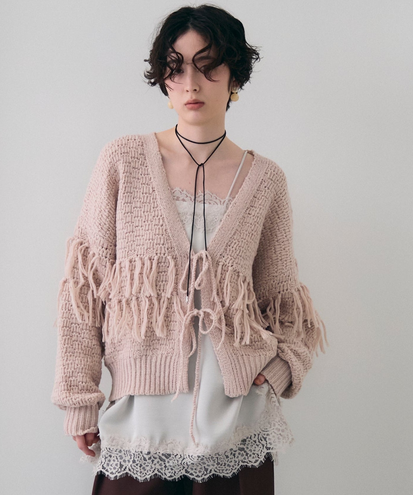 タック編み裏使いフリンジカーディガン