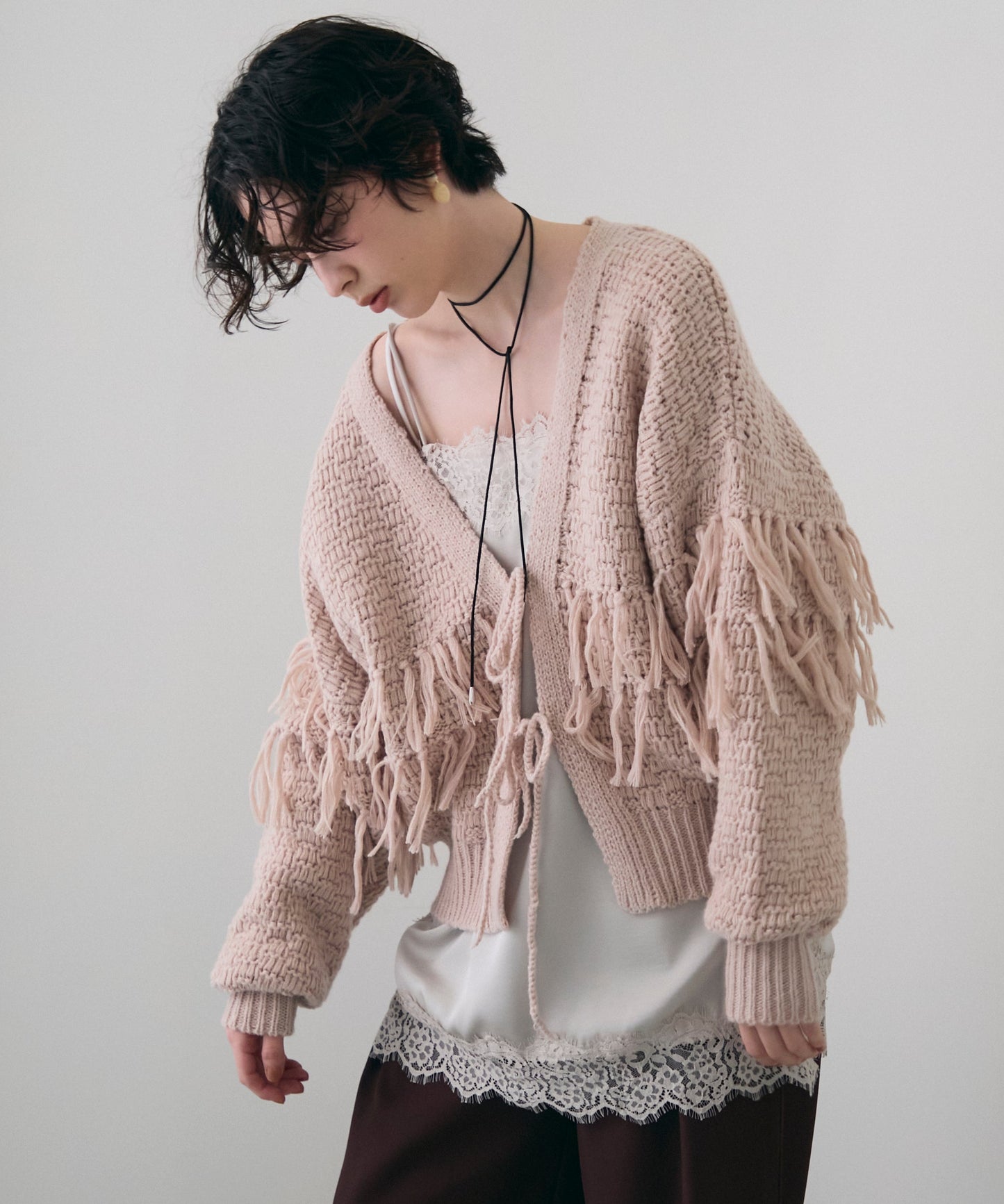 タック編み裏使いフリンジカーディガン