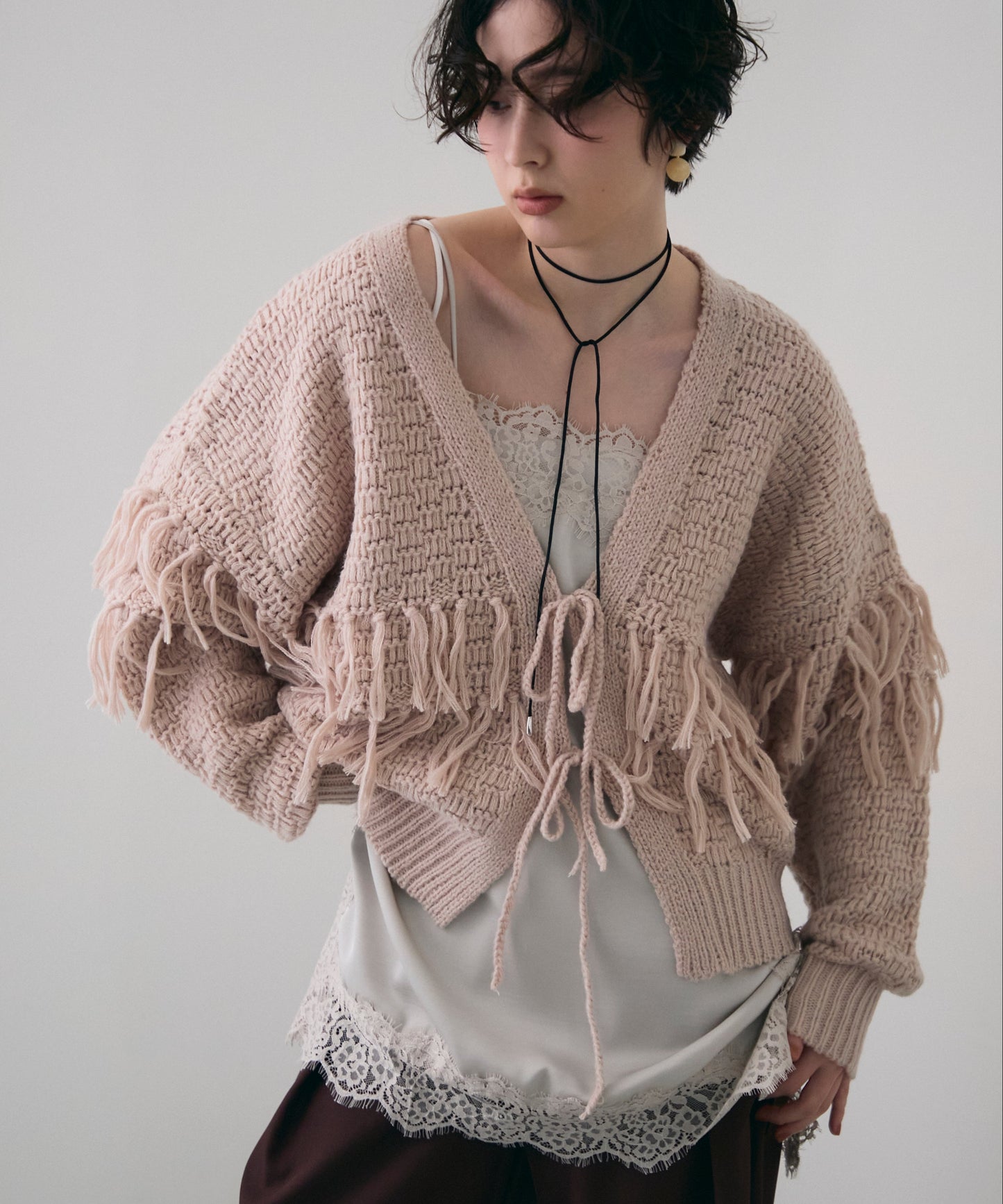 タック編み裏使いフリンジカーディガン