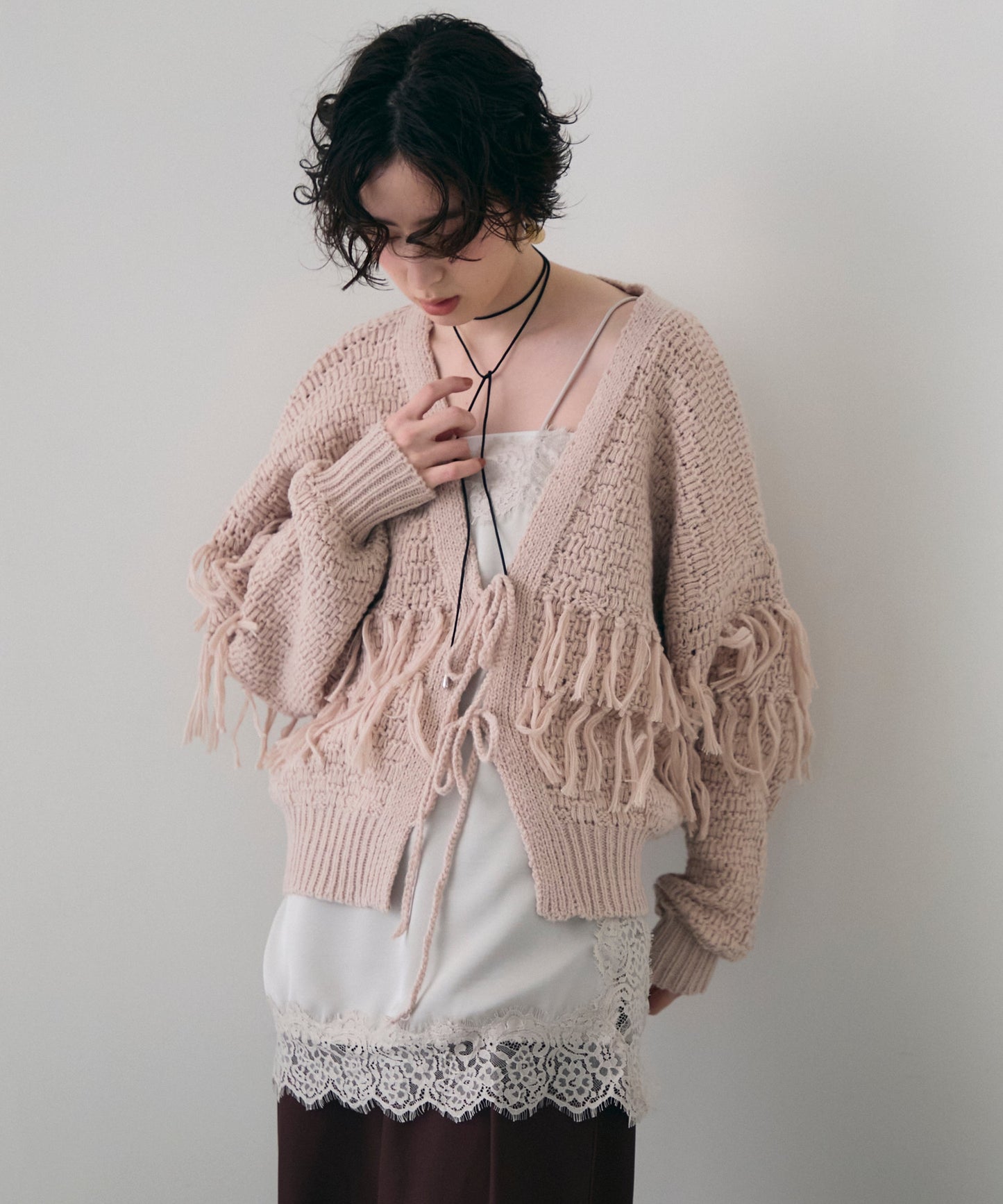 タック編み裏使いフリンジカーディガン
