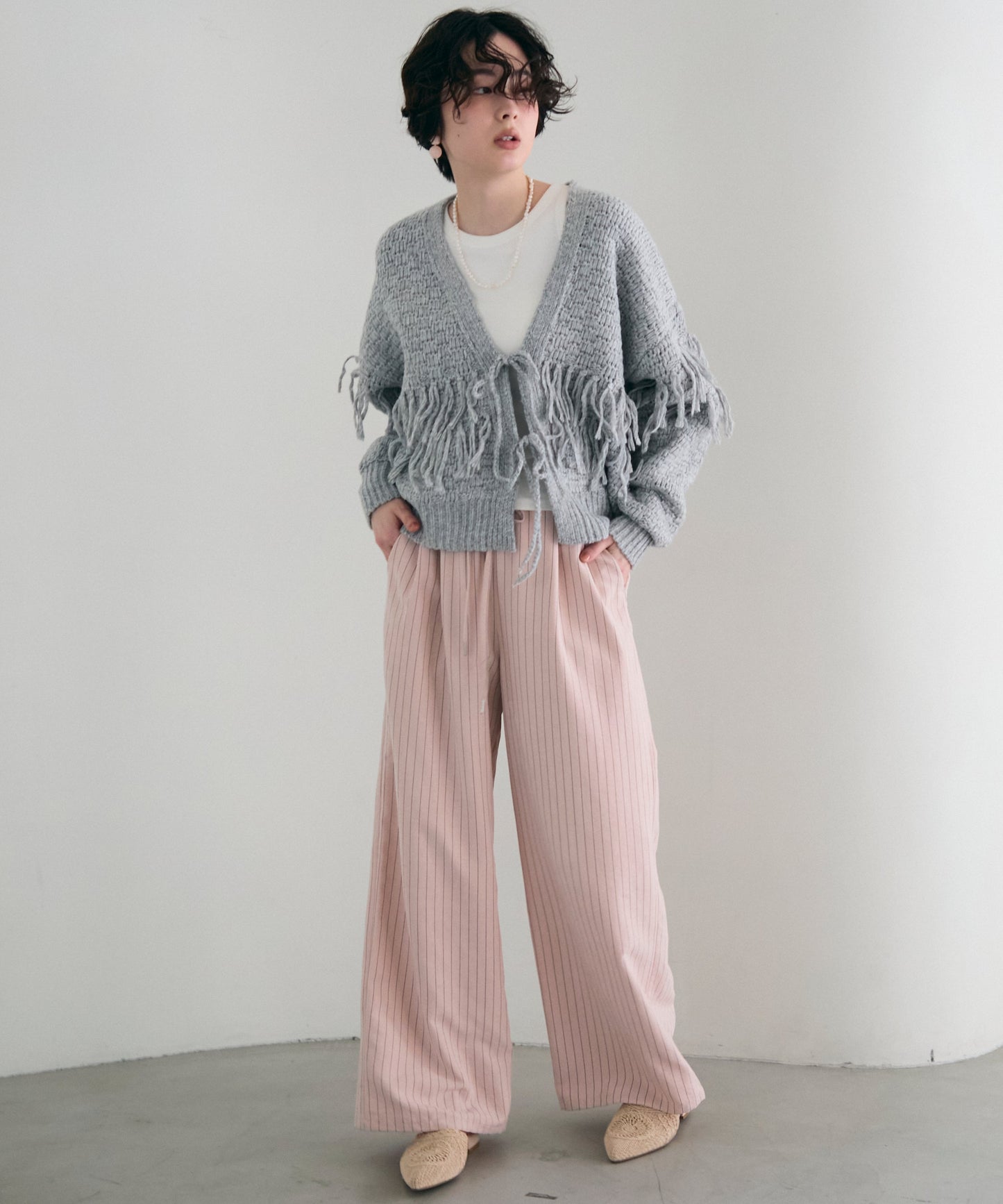 タック編み裏使いフリンジカーディガン