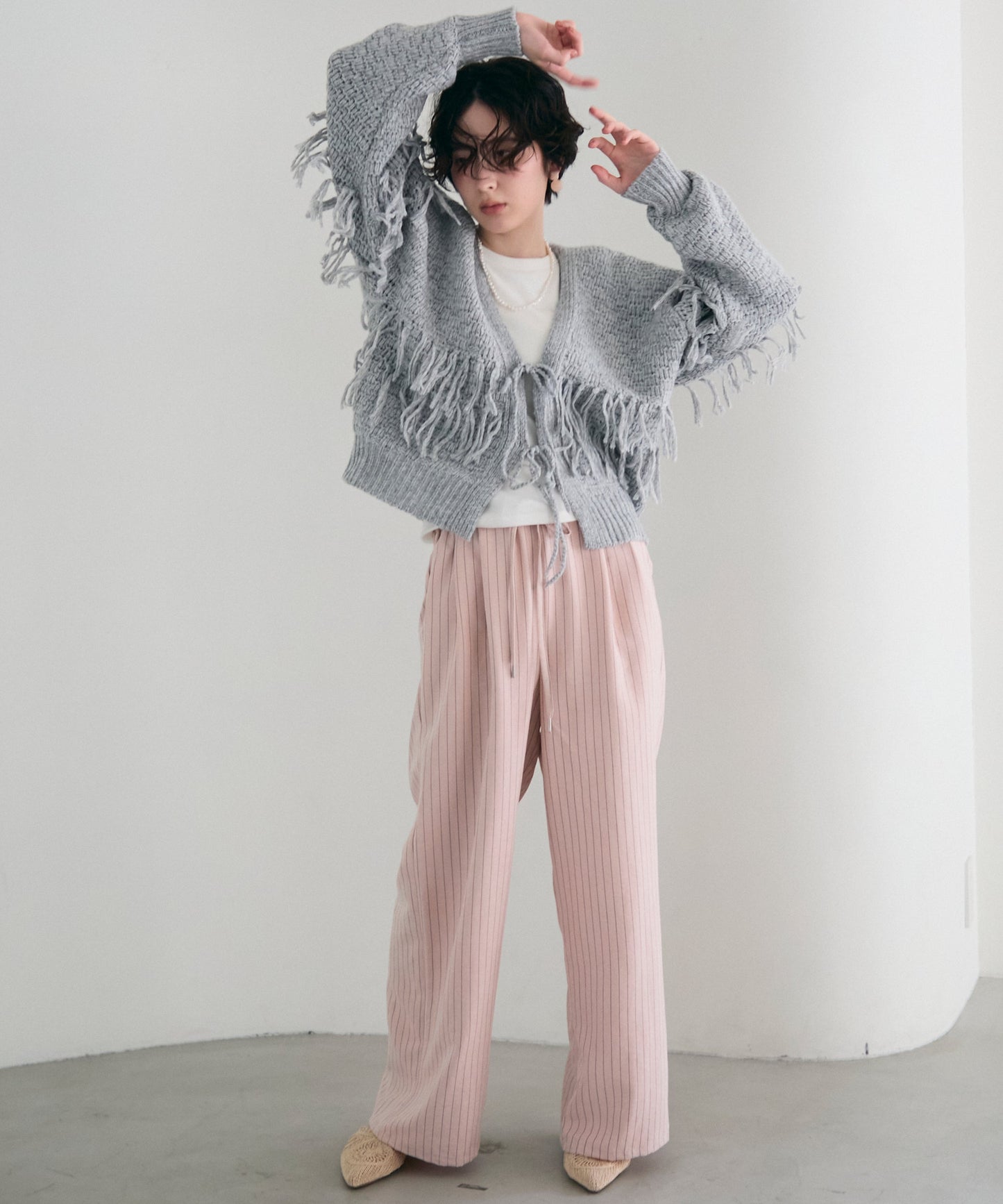 タック編み裏使いフリンジカーディガン