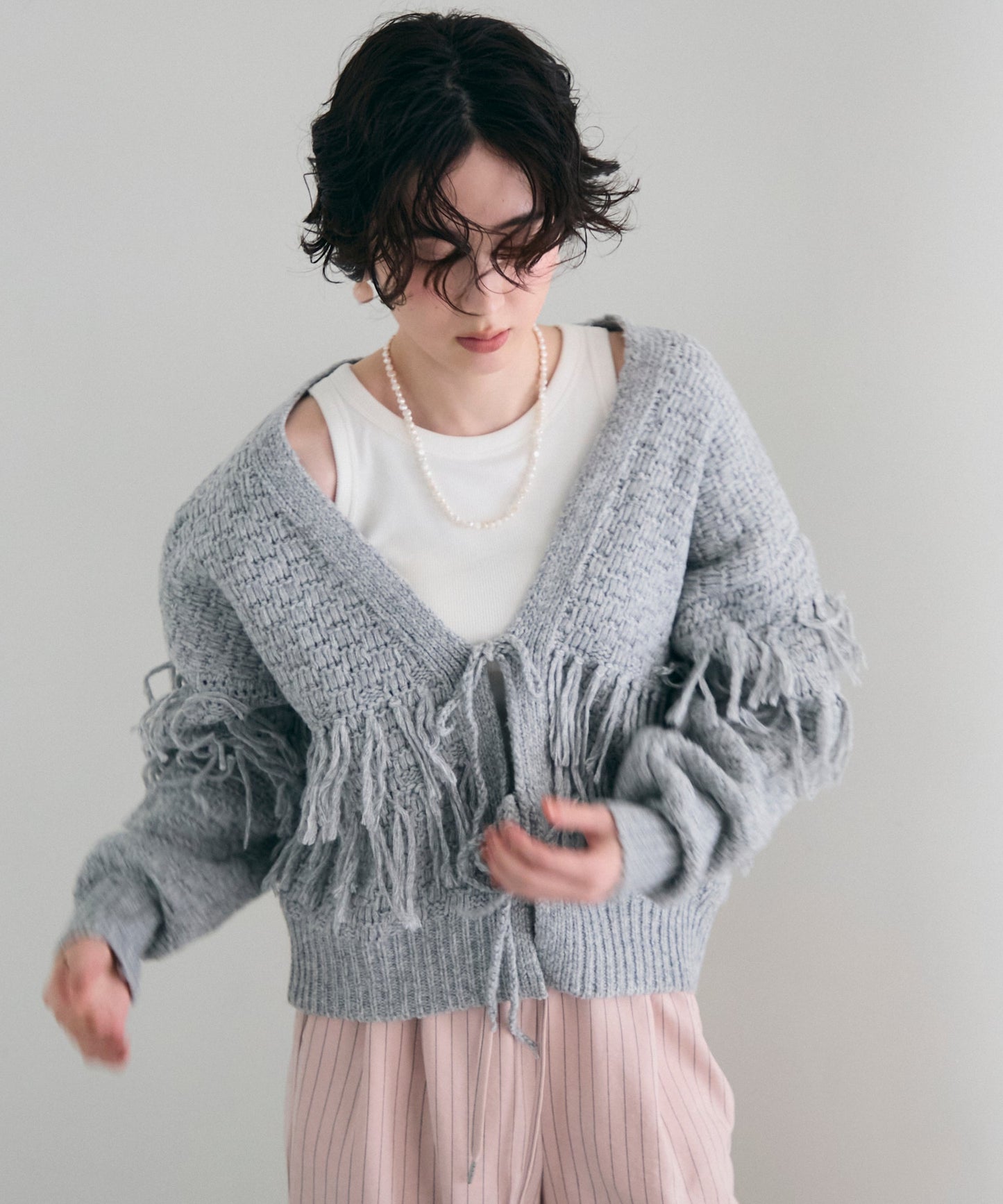 タック編み裏使いフリンジカーディガン