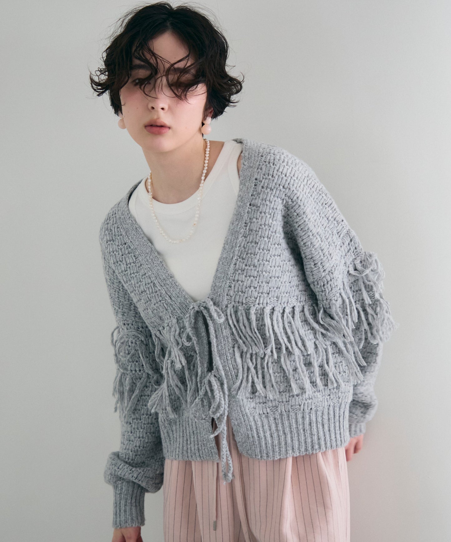 タック編み裏使いフリンジカーディガン