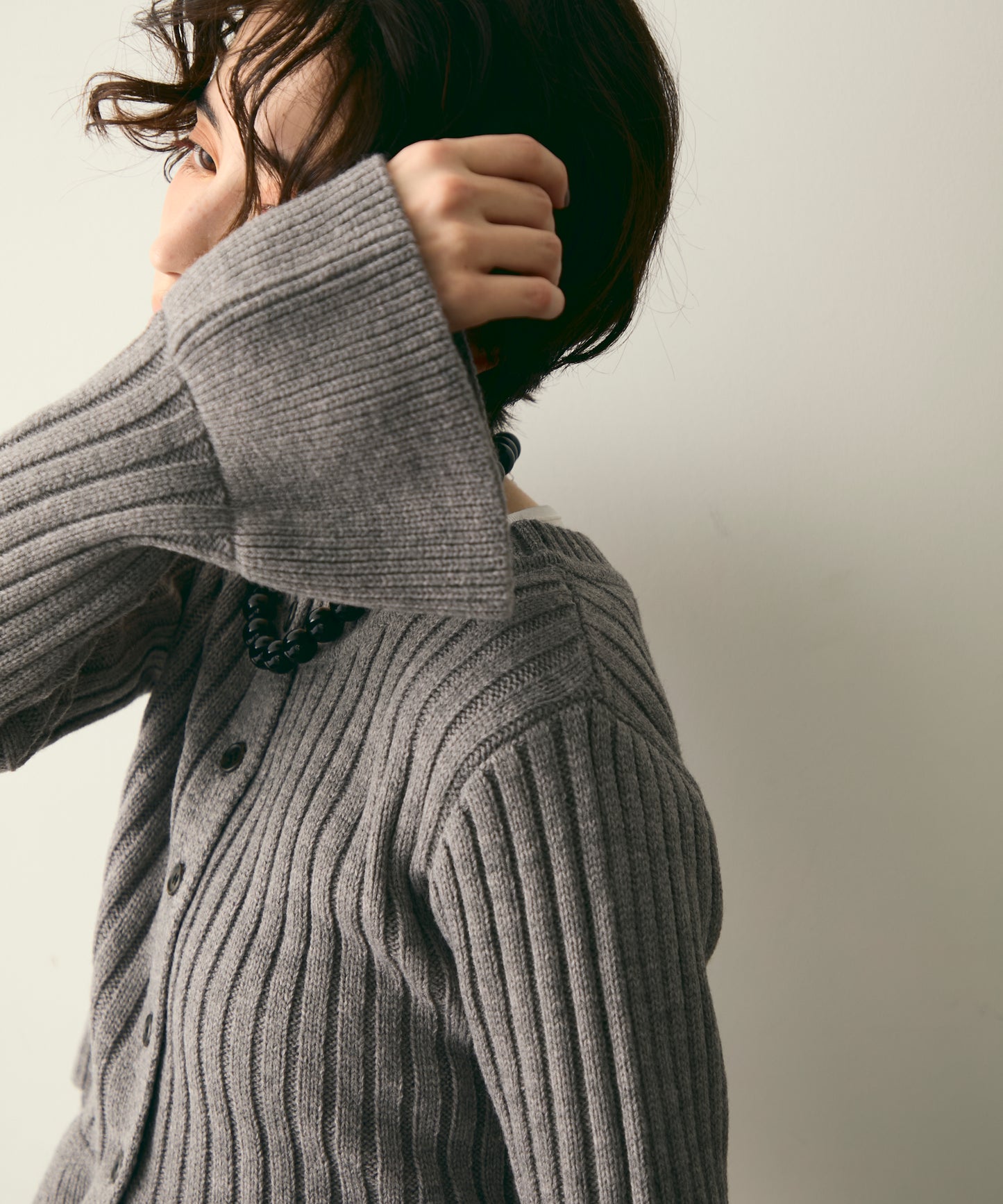 前後2WAYバルキーフリルヘムニットカーディガン