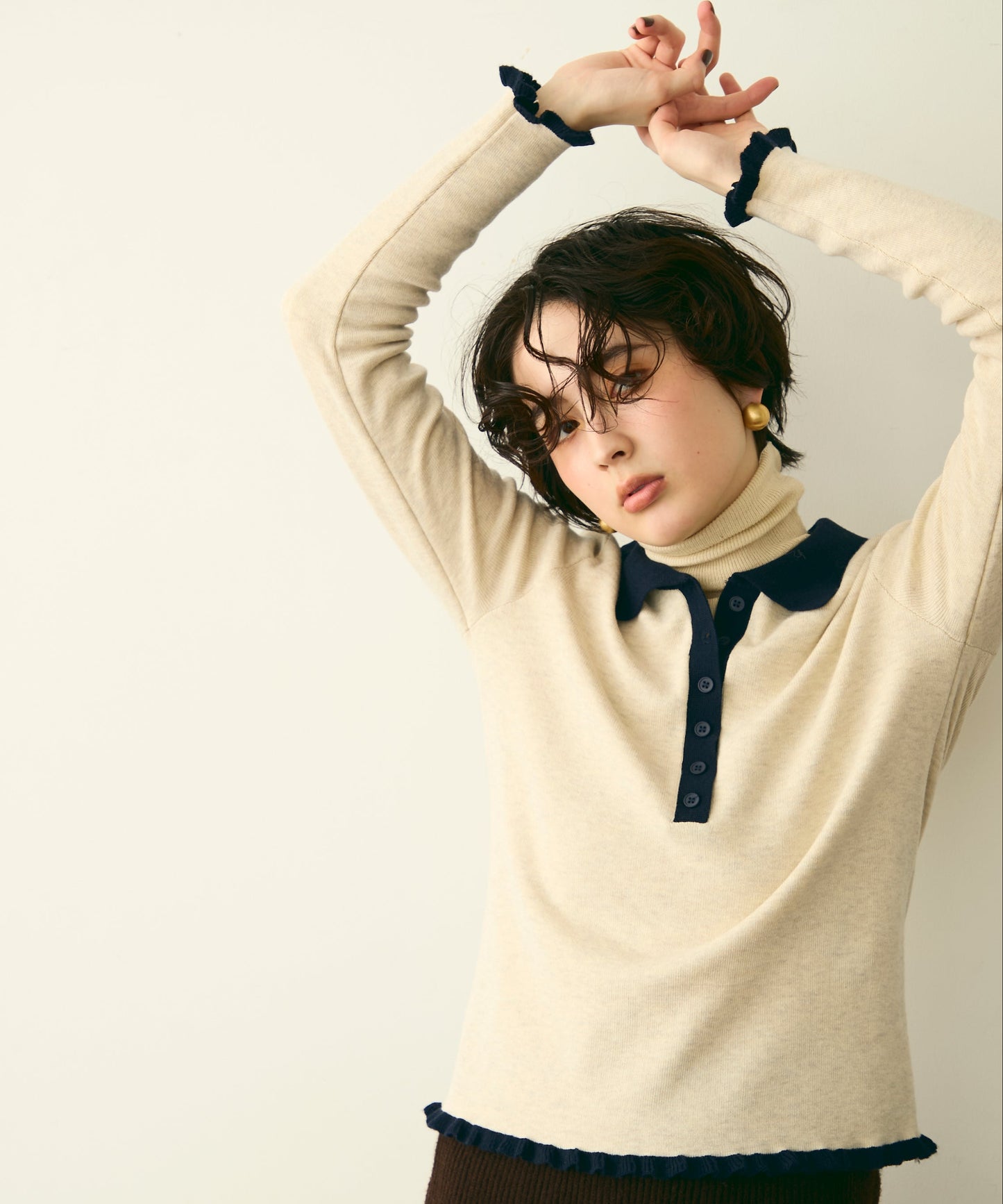 バイカラーポロ襟フリルヘムニットプルオーバー