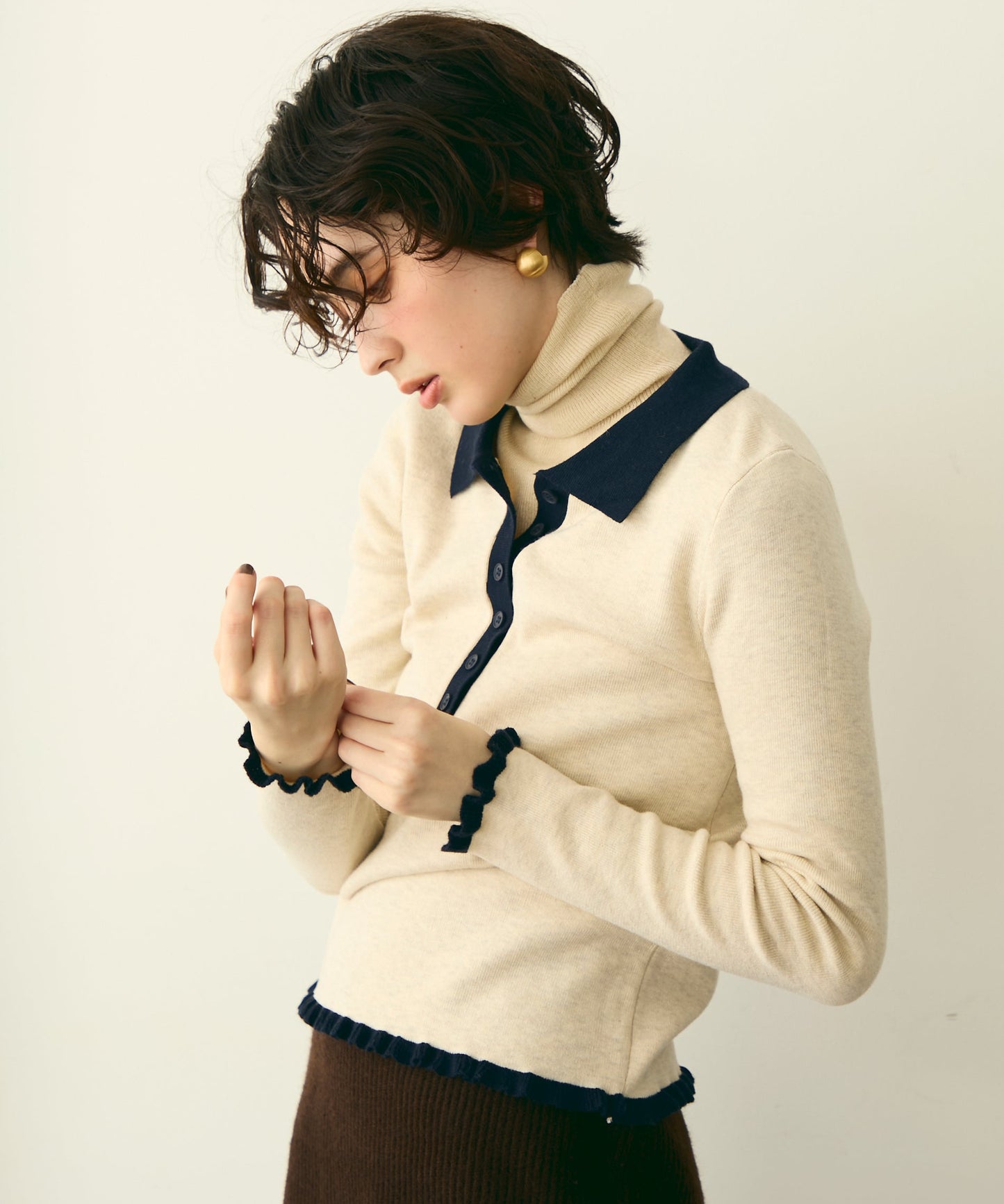 バイカラーポロ襟フリルヘムニットプルオーバー