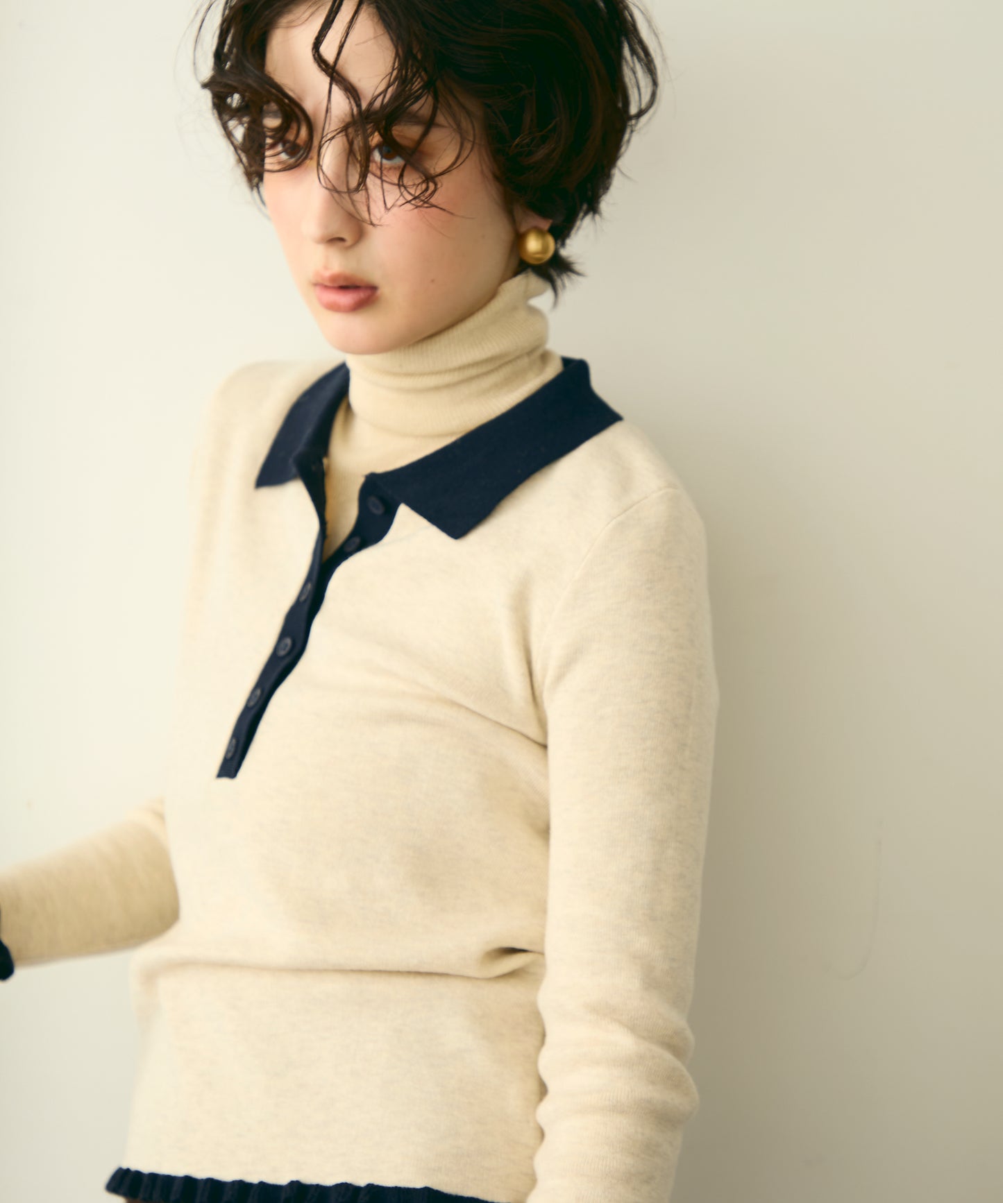 バイカラーポロ襟フリルヘムニットプルオーバー