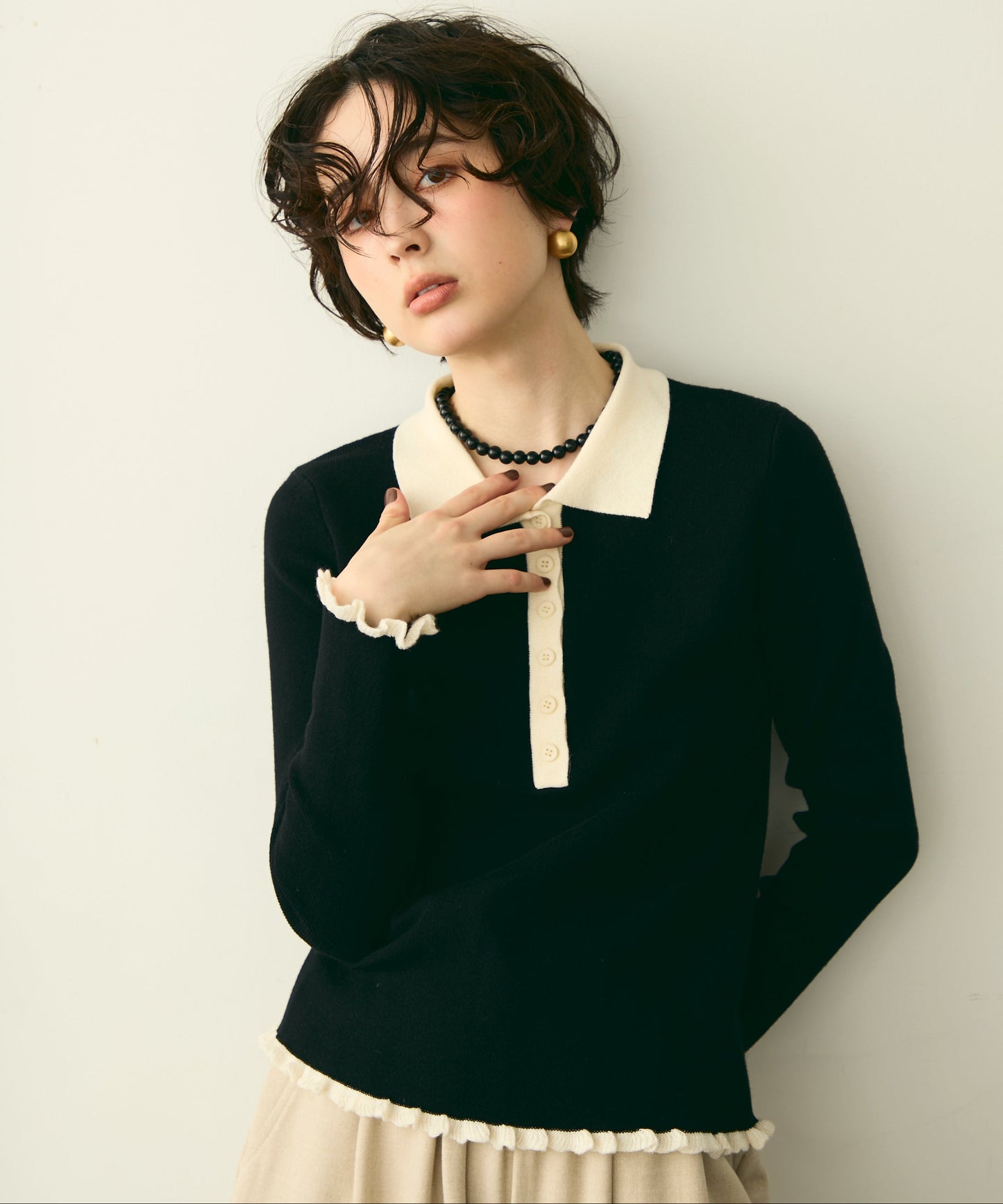 バイカラーポロ襟フリルヘムニットプルオーバー
