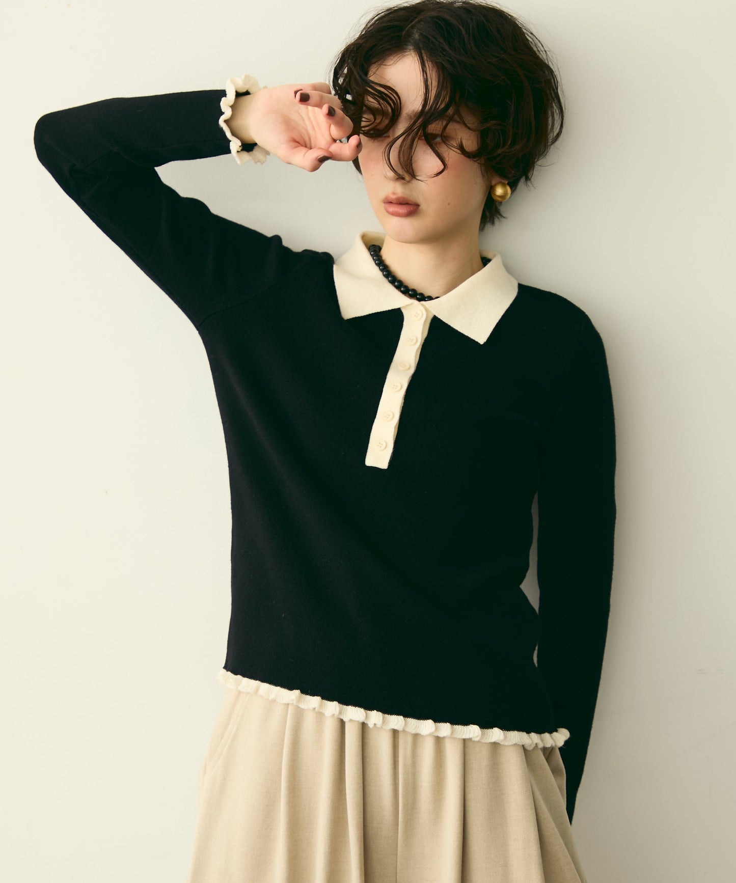 バイカラーポロ襟フリルヘムニットプルオーバー