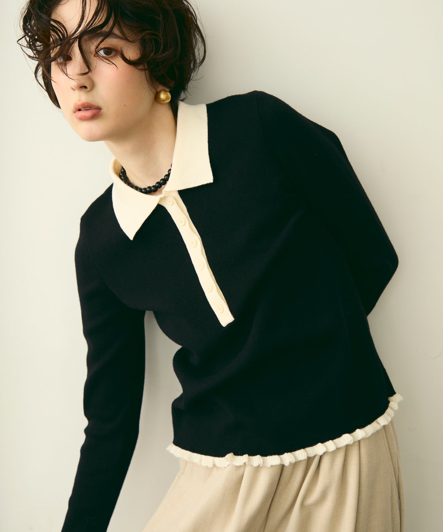 バイカラーポロ襟フリルヘムニットプルオーバー
