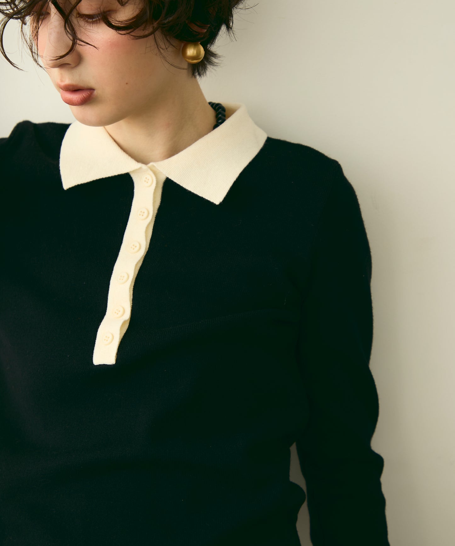 バイカラーポロ襟フリルヘムニットプルオーバー