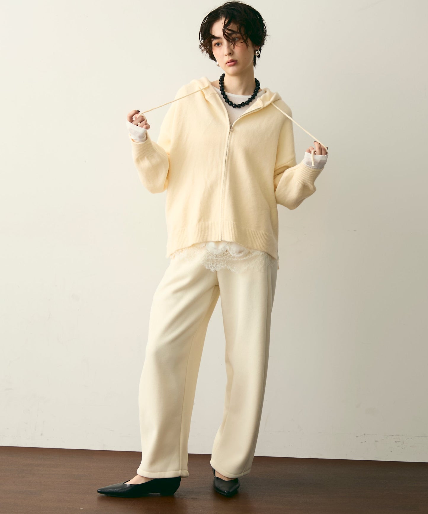 メランジニットZIPパーカー