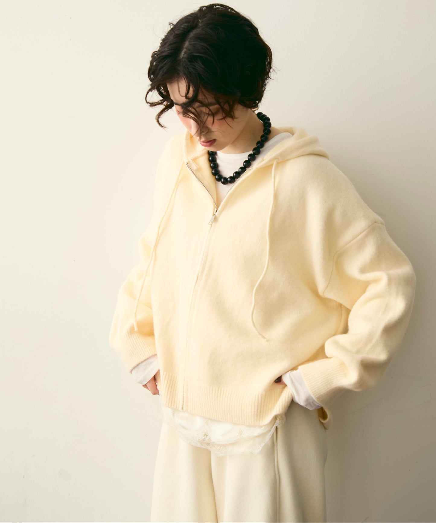 メランジニットZIPパーカー