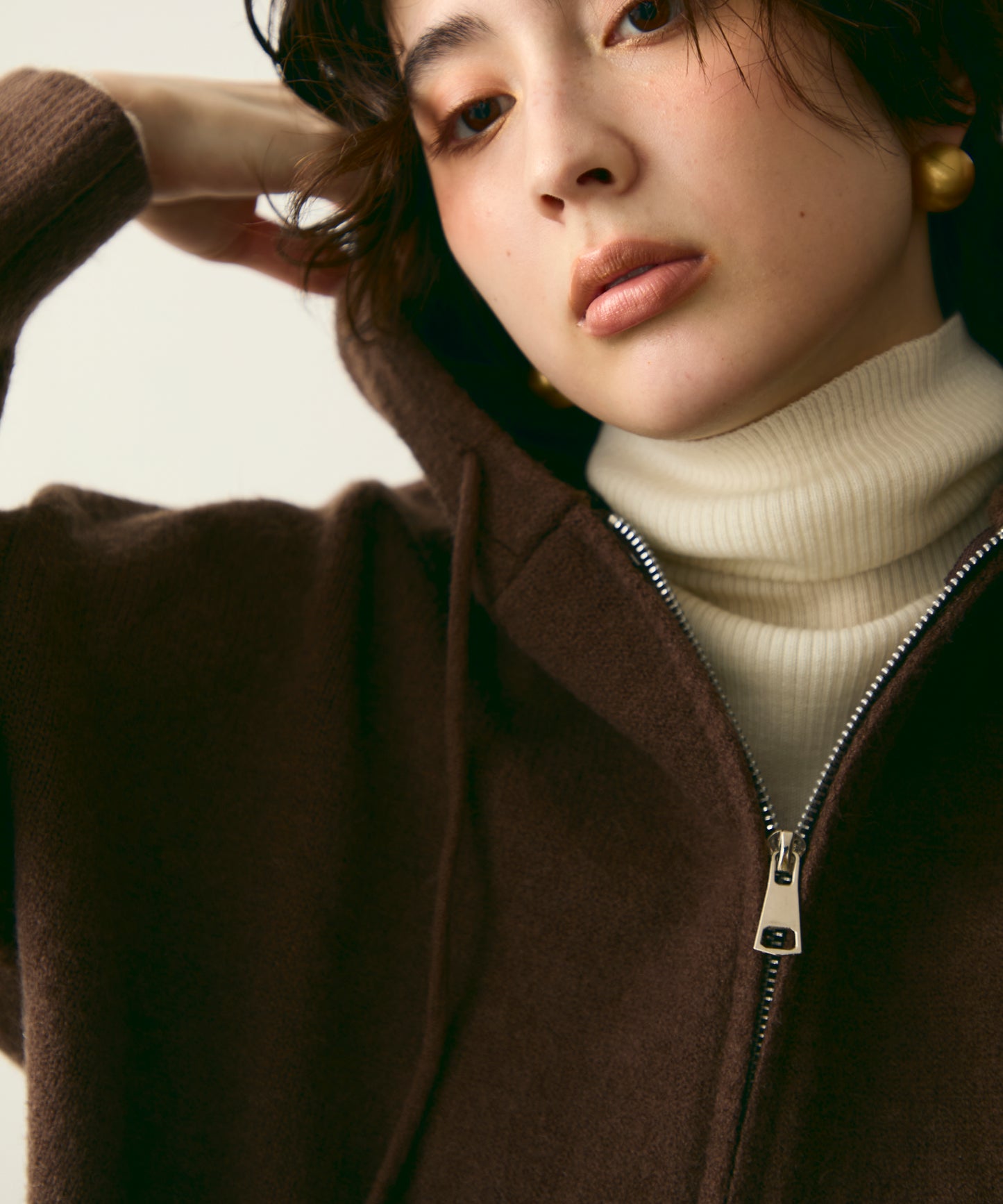 メランジニットZIPパーカー