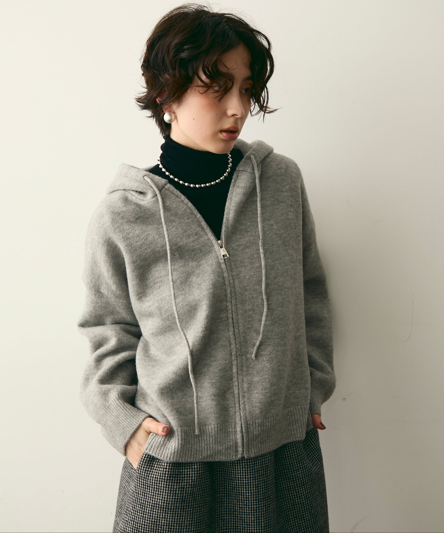 メランジニットZIPパーカー