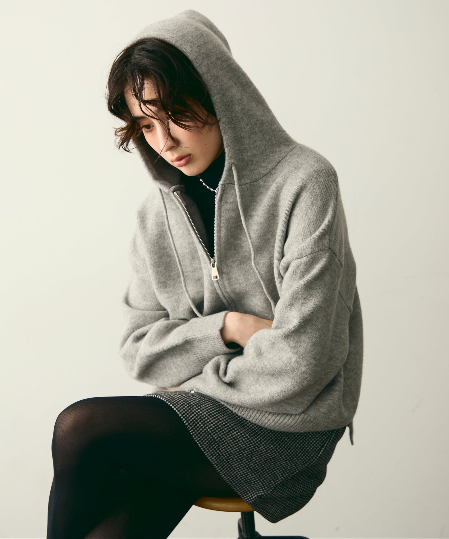 メランジニットZIPパーカー