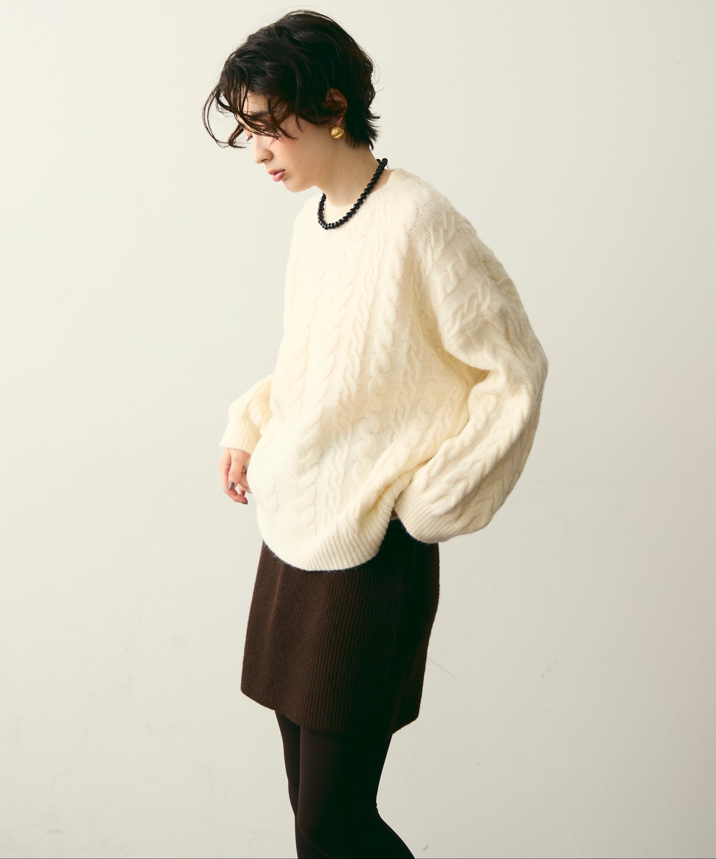 ケーブル編みルーズニットプルオーバー