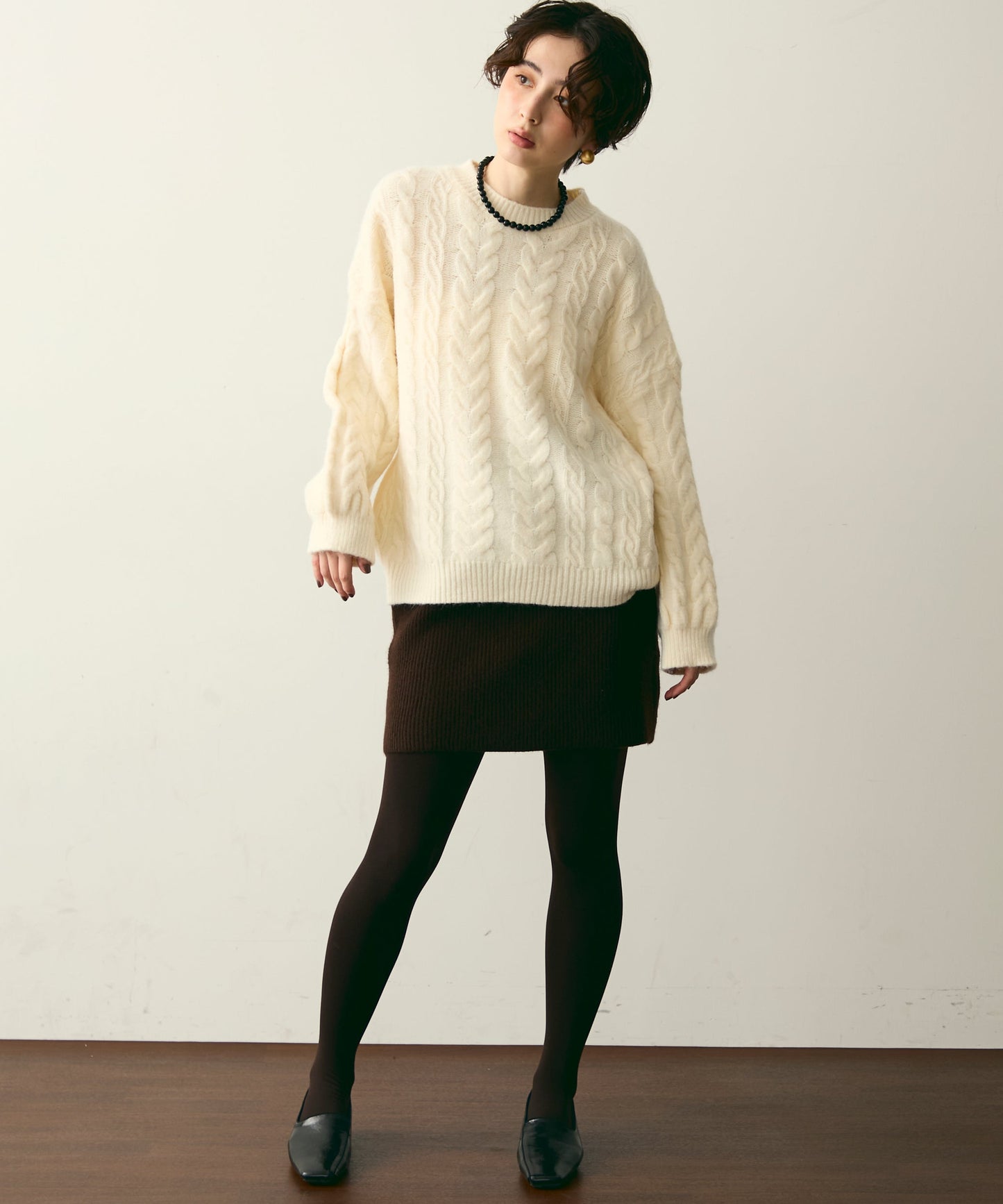 ケーブル編みルーズニットプルオーバー