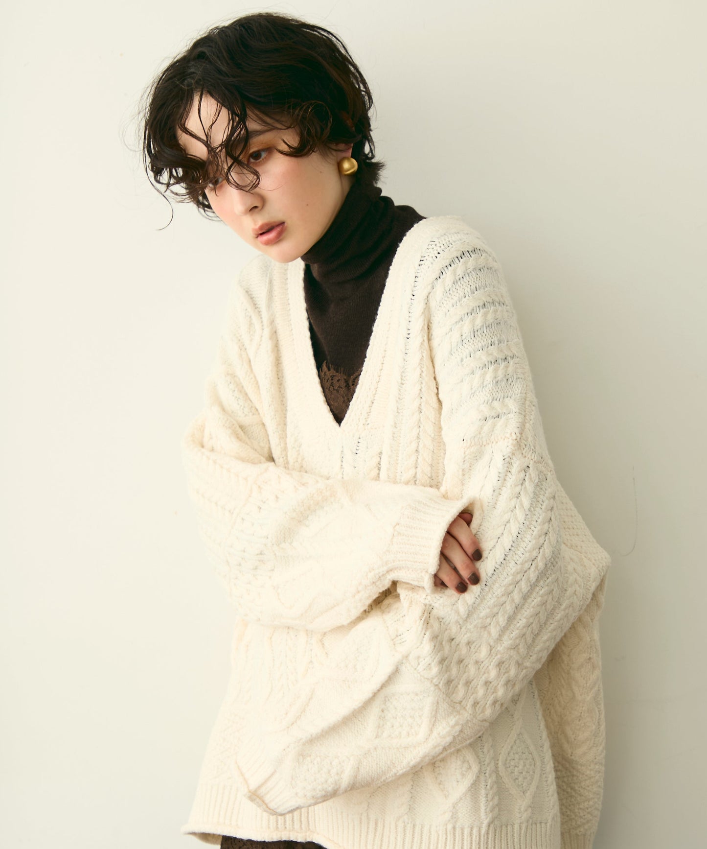 タートルネックリブ編みニットプルオーバー