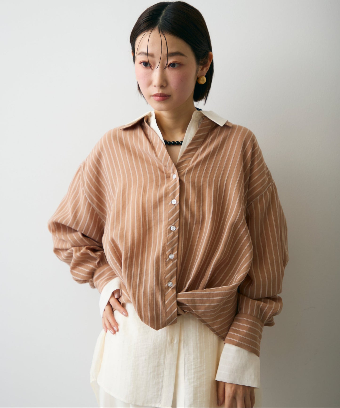 シアーストライプねじれブラウス