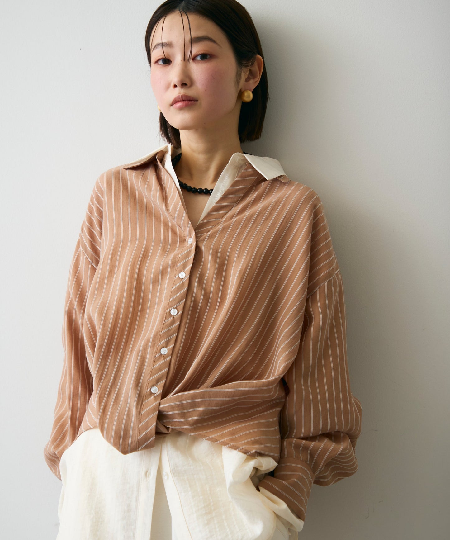 シアーストライプねじれブラウス