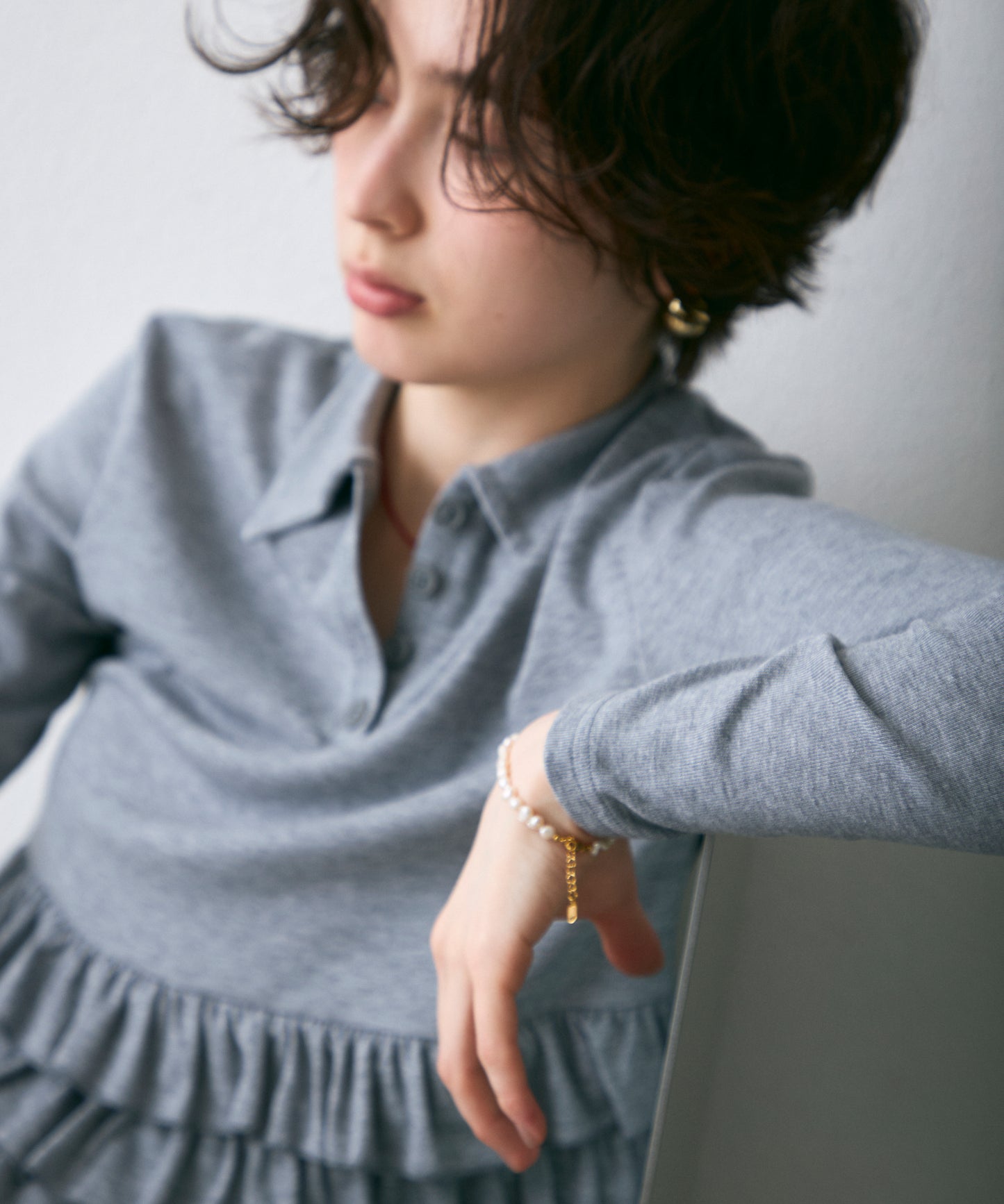 フライス裾フリルポロカラープルオーバー